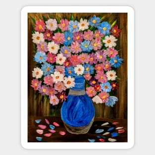 A lovely boutique of flowers in different shade of pink and purple and white . In a beautiful blue metallic vase . Sticker